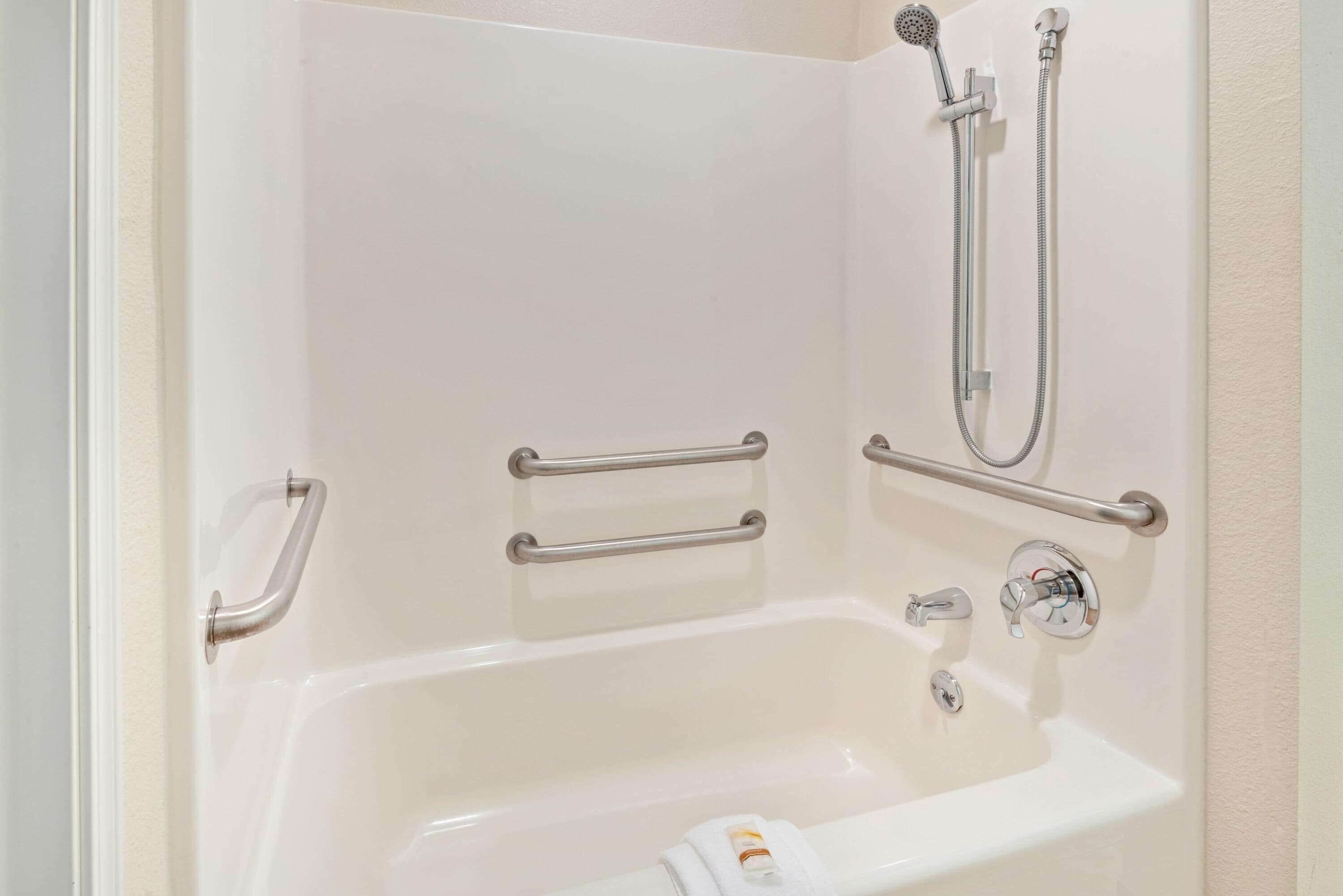 combined shower/bathtub, free toiletries, hair dryer, towels