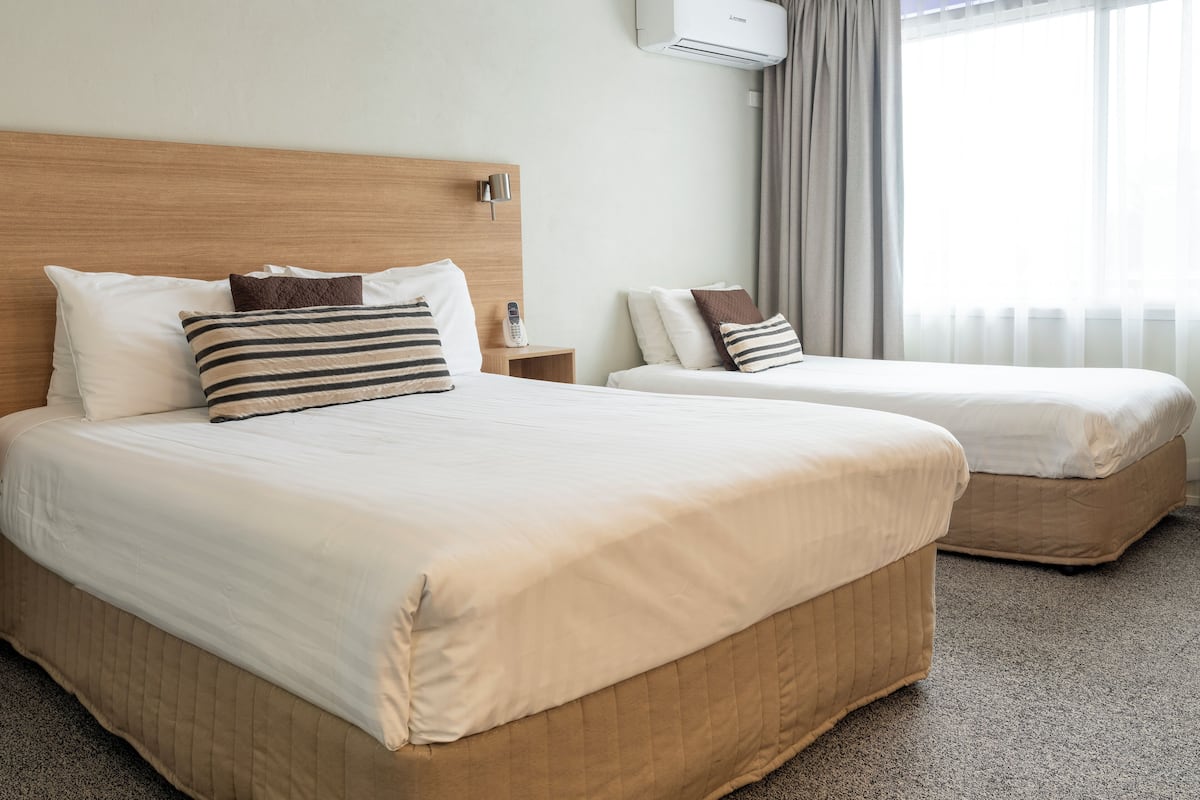 Down duvets, Select Comfort beds, desk, iron/ironing board