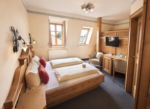 Chambre Triple Confort | 1 chambre, literie hypoallergénique, coffres-forts dans les chambres