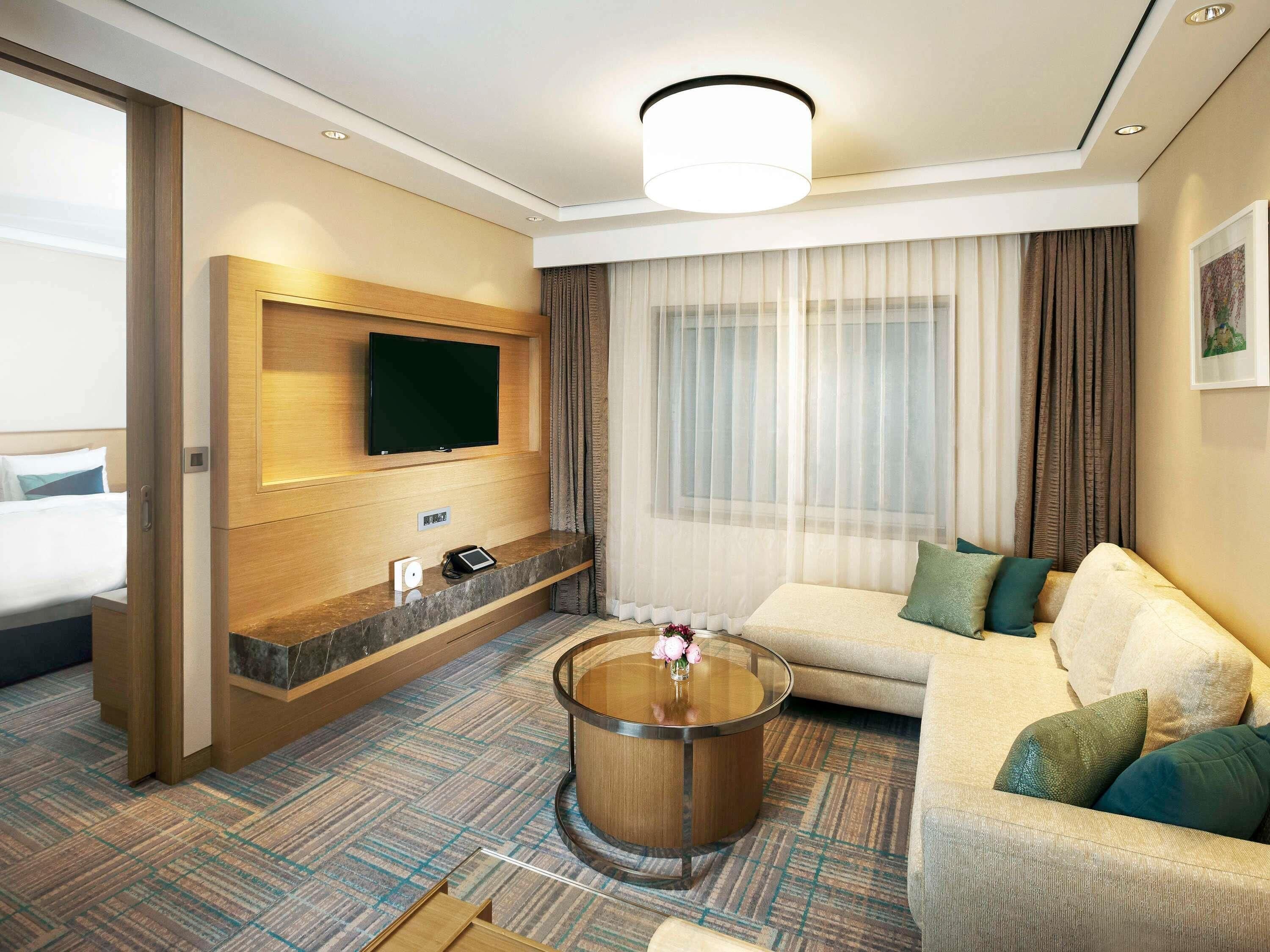 Premier Suite, 1 King Bed | Premium bedding, down comforters, in-room safe, individually decorated