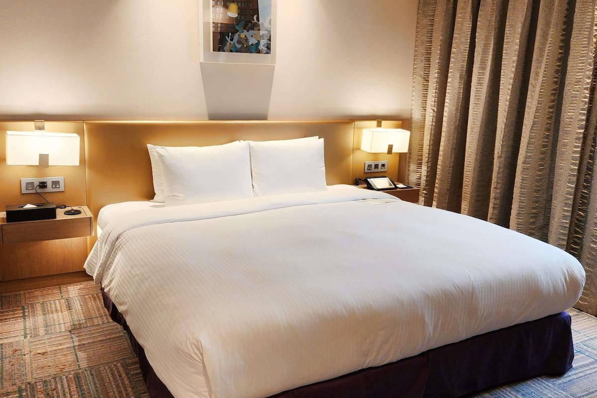 Premier Suite, 1 King Bed | Premium bedding, down comforters, in-room safe, individually decorated