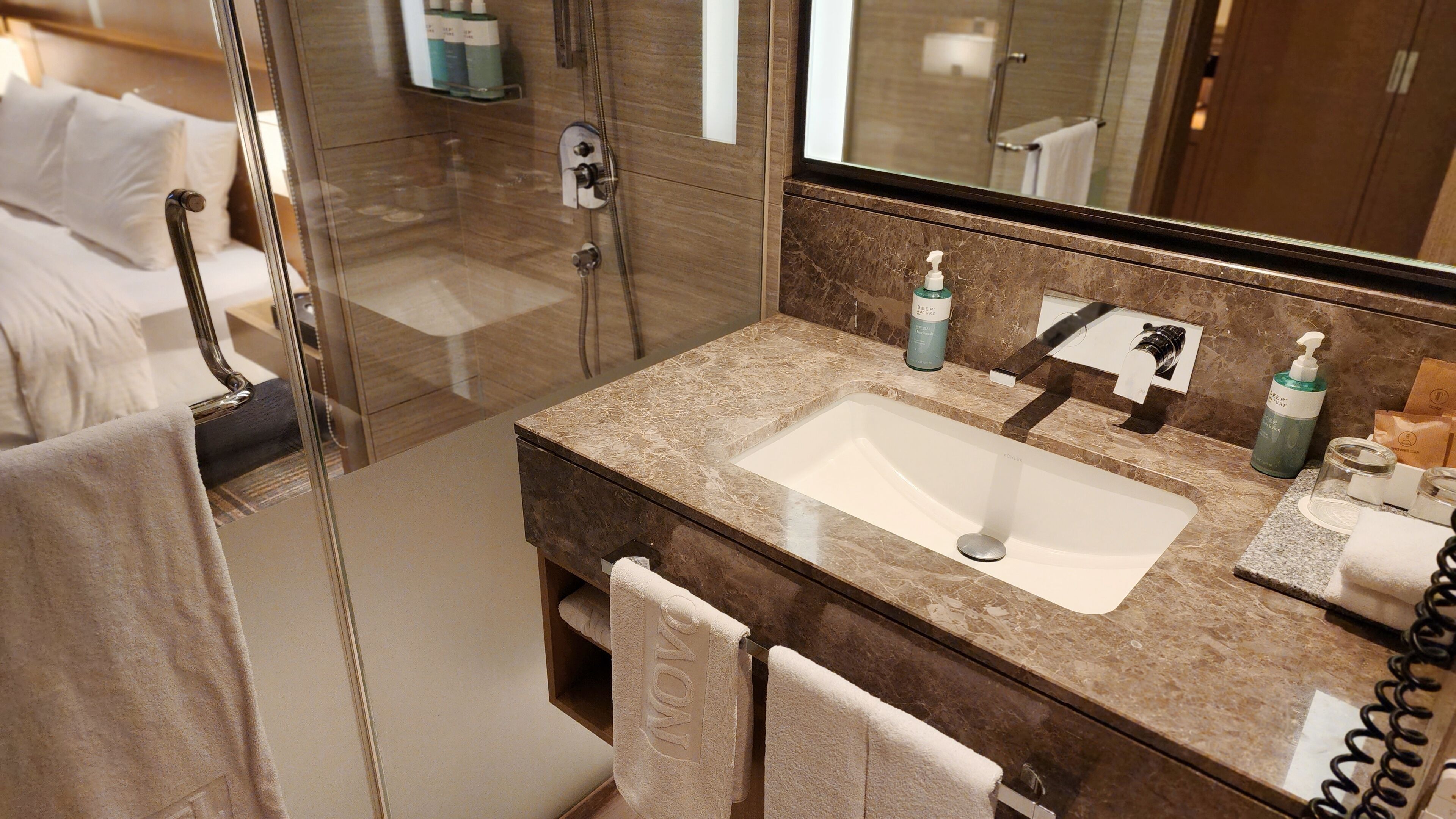 eco-friendly toiletries, hair dryer, bathrobes, slippers