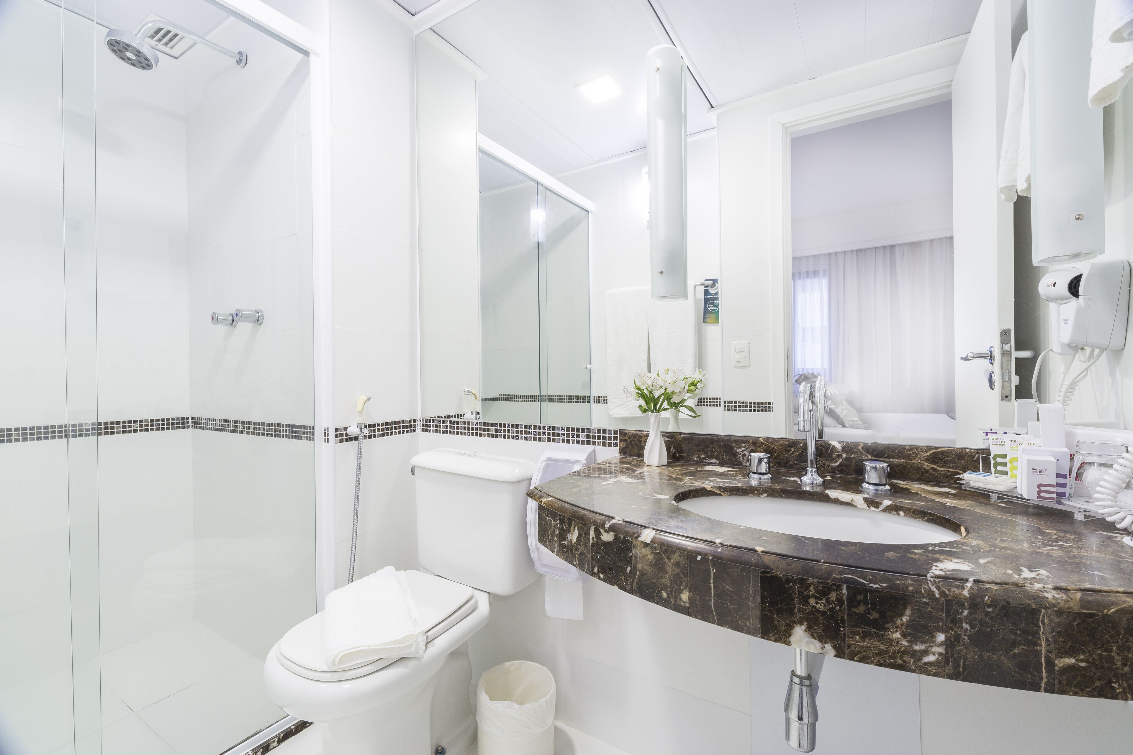 shower, eco-friendly toiletries, hair dryer, towels