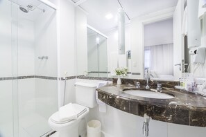 Shower, eco-friendly toiletries, hair dryer, towels