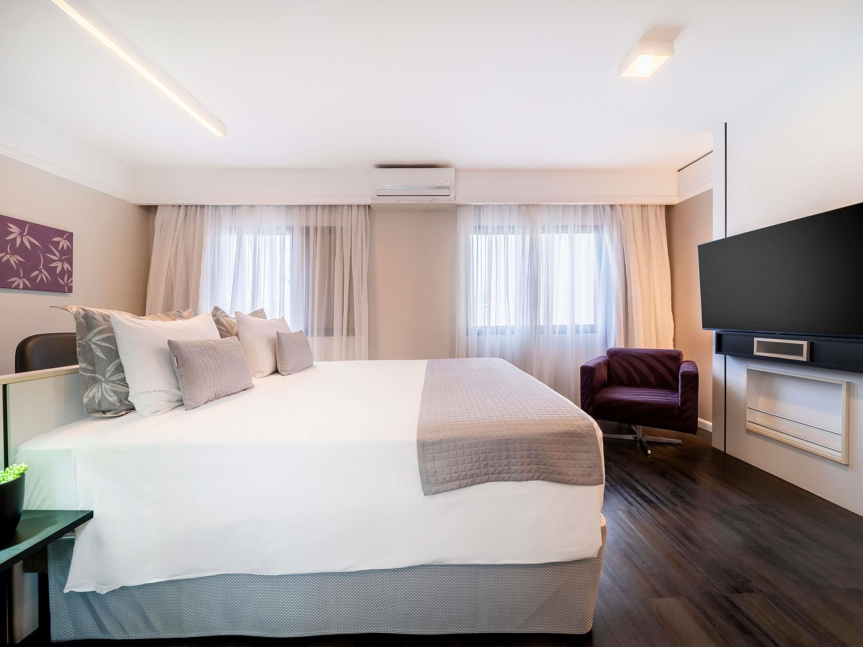 Superior Apartment, 1 Queen Bed | Minibar, in-room safe, desk, blackout drapes