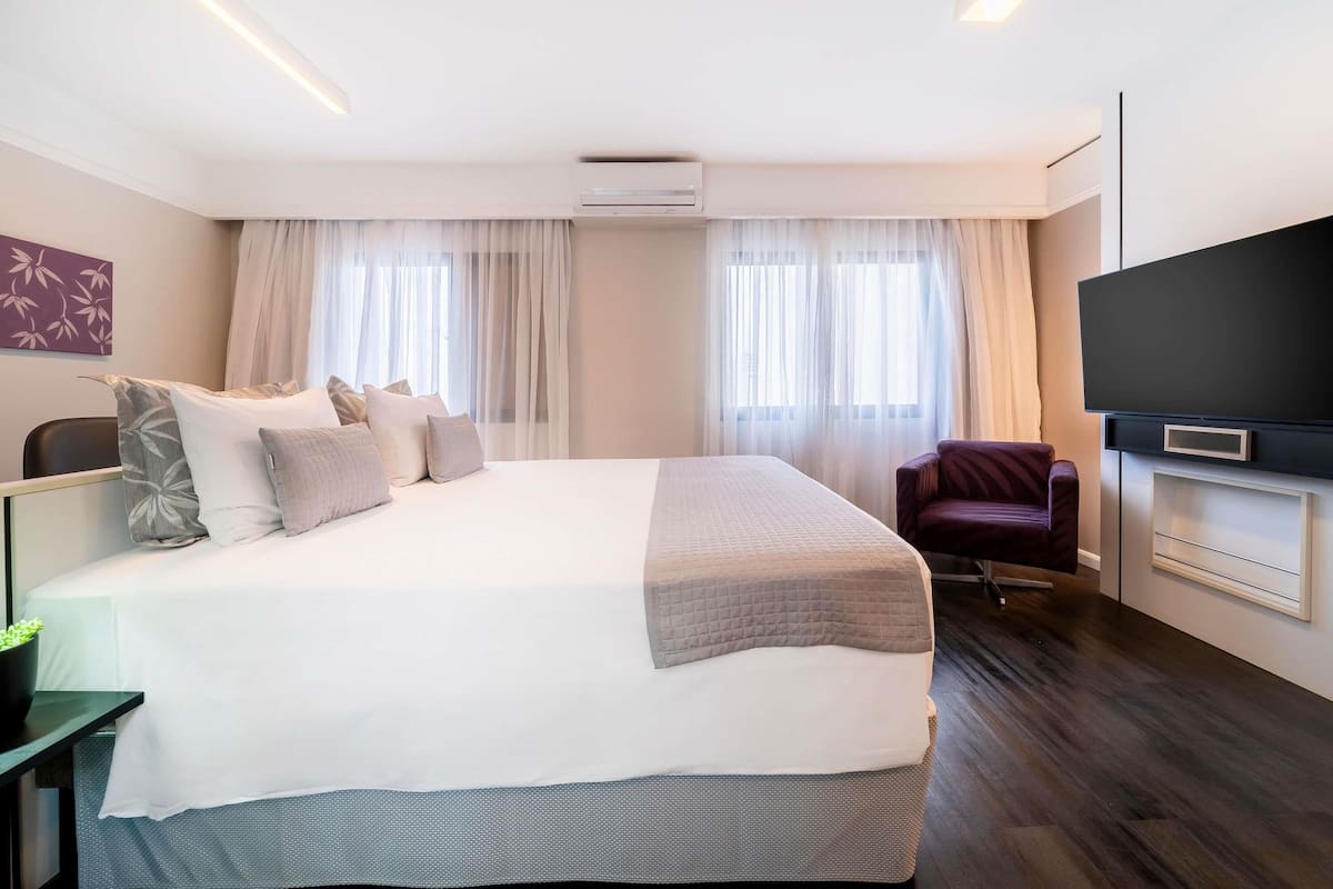 Superior Apartment, 1 Queen Bed | Minibar, in-room safe, desk, blackout drapes