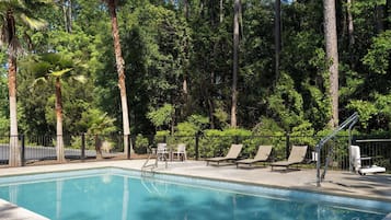 Seasonal outdoor pool, open 9:00 AM to 9:00 PM, pool loungers