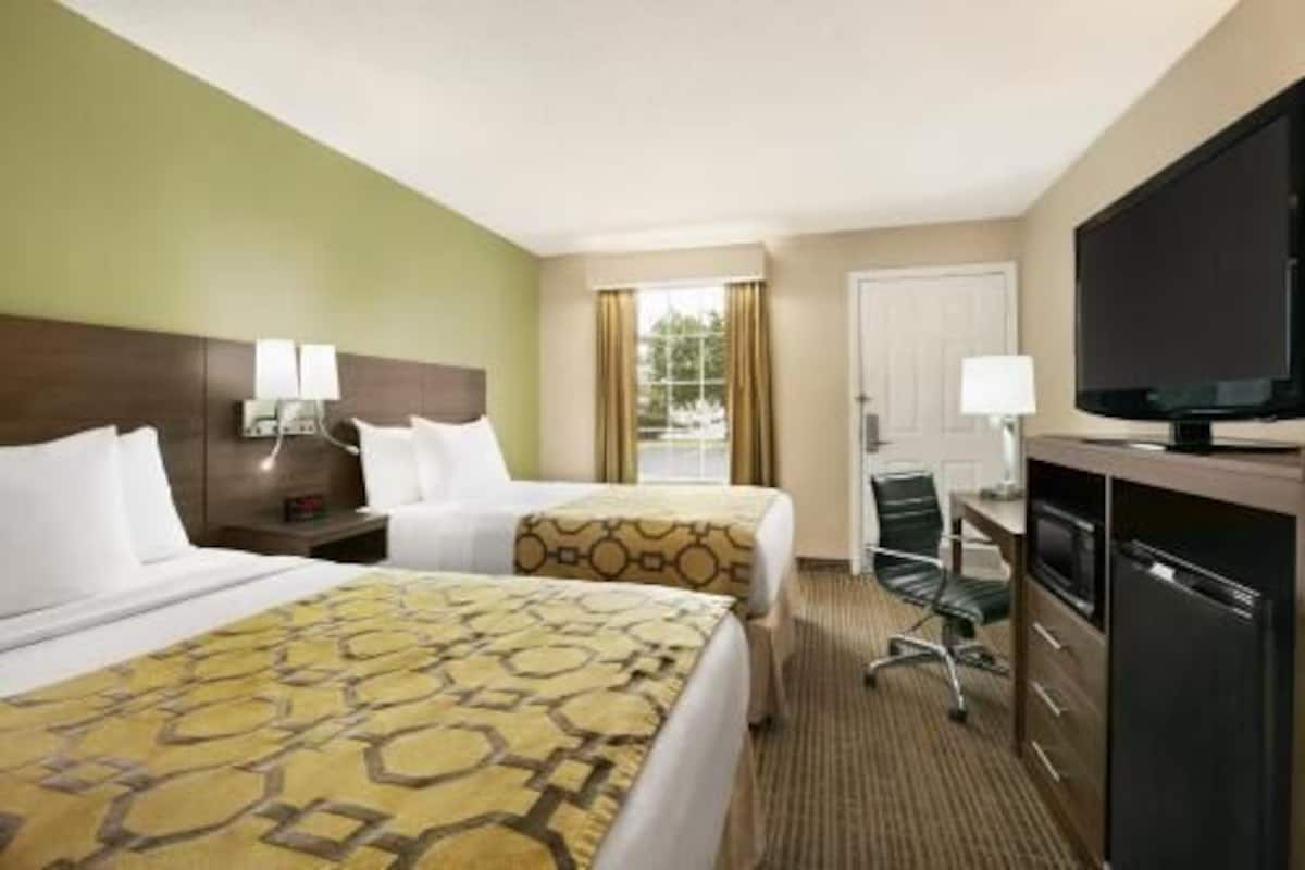 Pillowtop beds, desk, blackout drapes, iron/ironing board