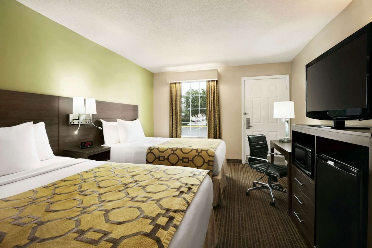 Pillowtop beds, desk, blackout drapes, iron/ironing board