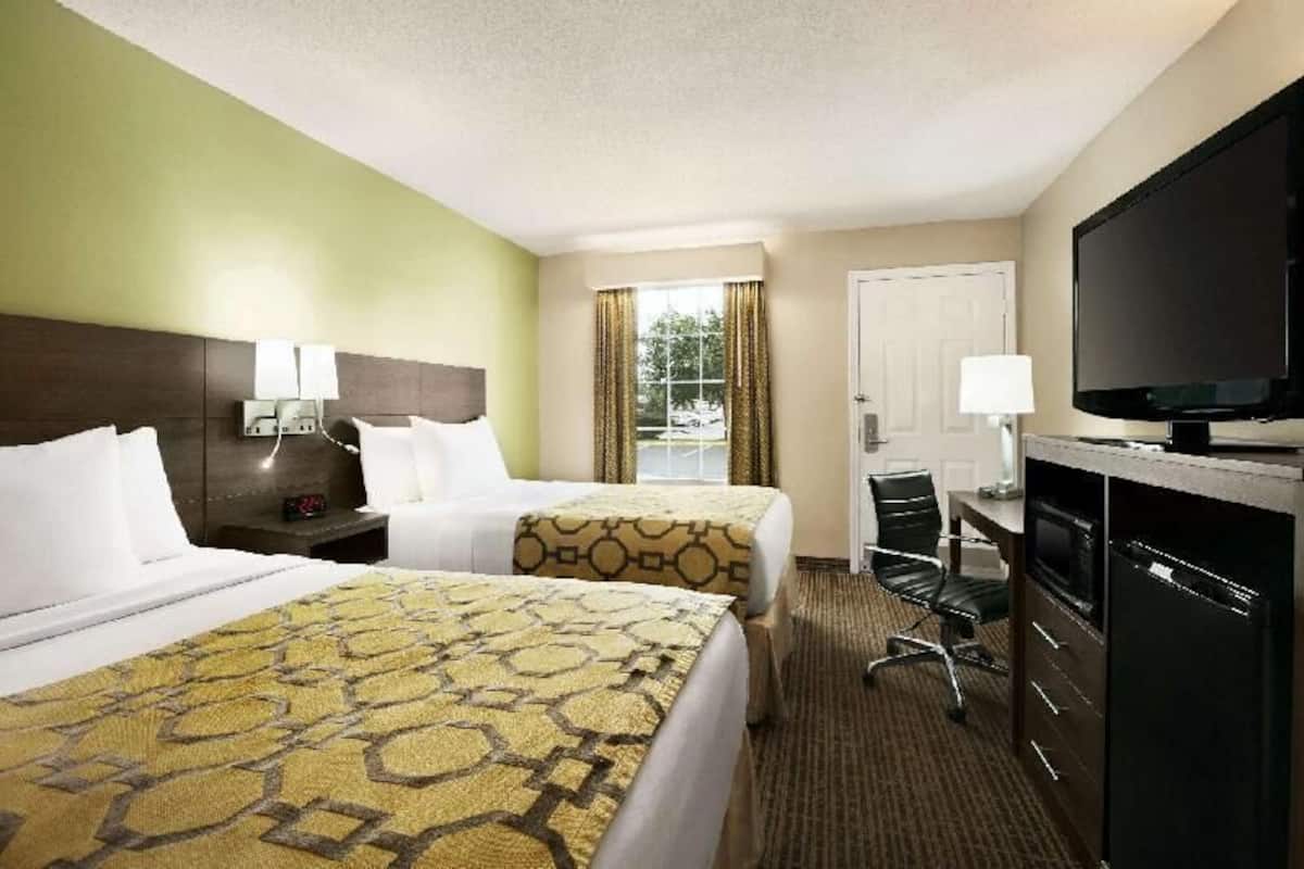 Pillowtop beds, desk, blackout drapes, iron/ironing board