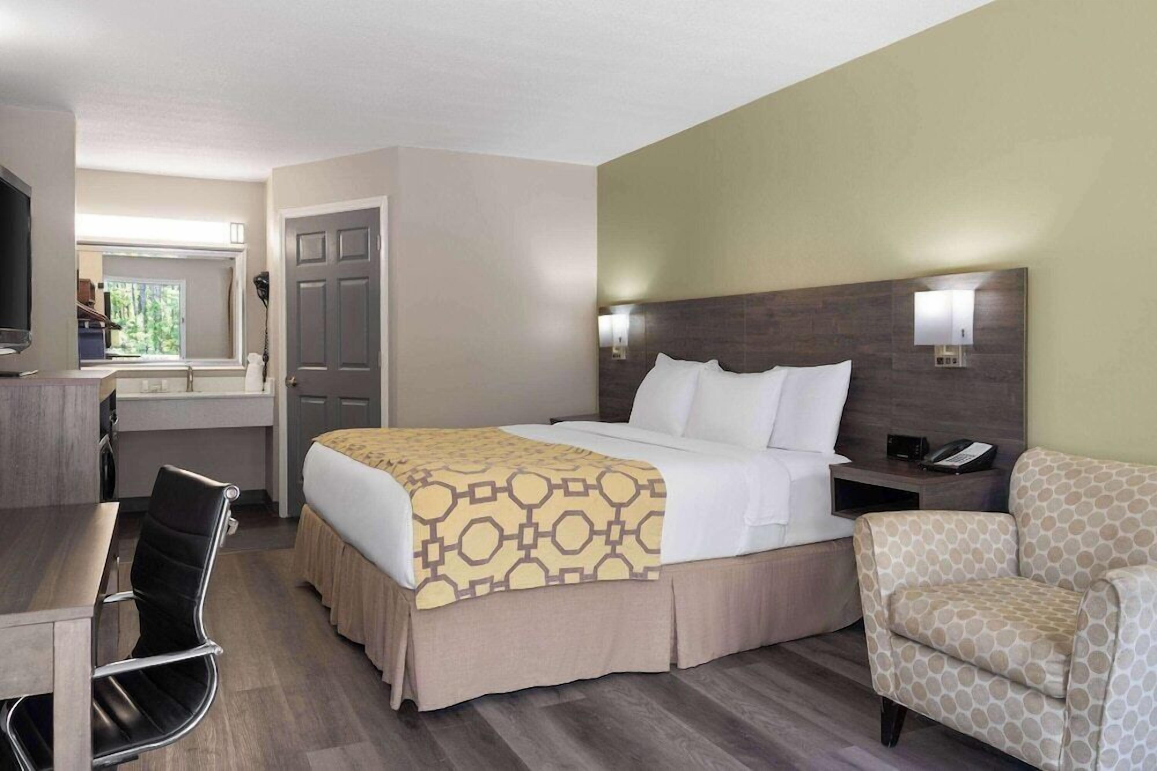 Pillow-top beds, desk, blackout curtains, iron/ironing board