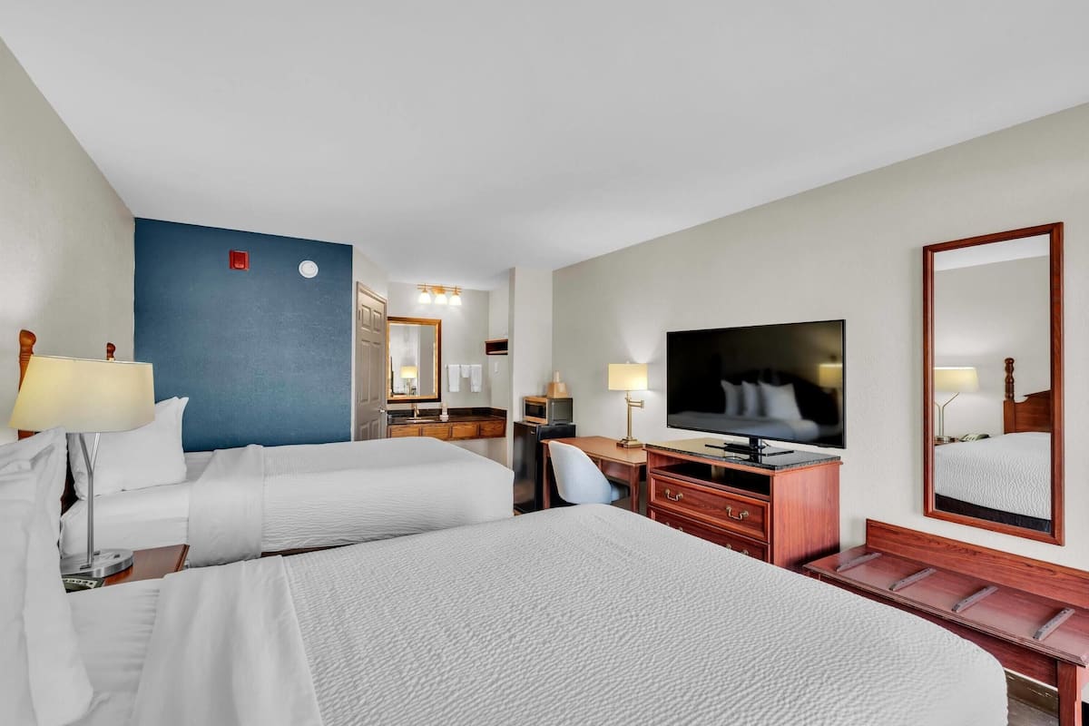 Desk, blackout drapes, soundproofing, iron/ironing board