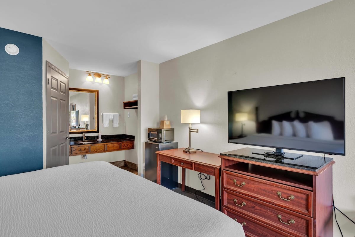 Desk, blackout drapes, soundproofing, iron/ironing board