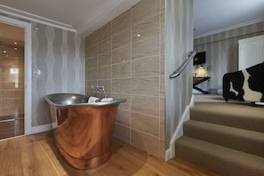 Designer toiletries, hair dryer, towels