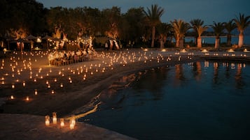 On the beach, sun loungers, beach umbrellas, beach towels