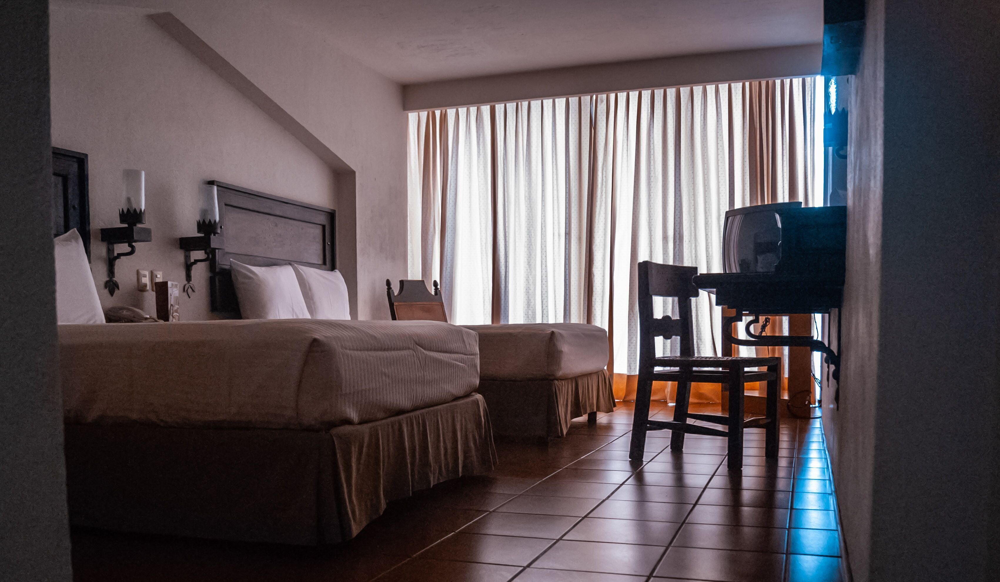 Premium bedding, down comforters, blackout drapes, free WiFi