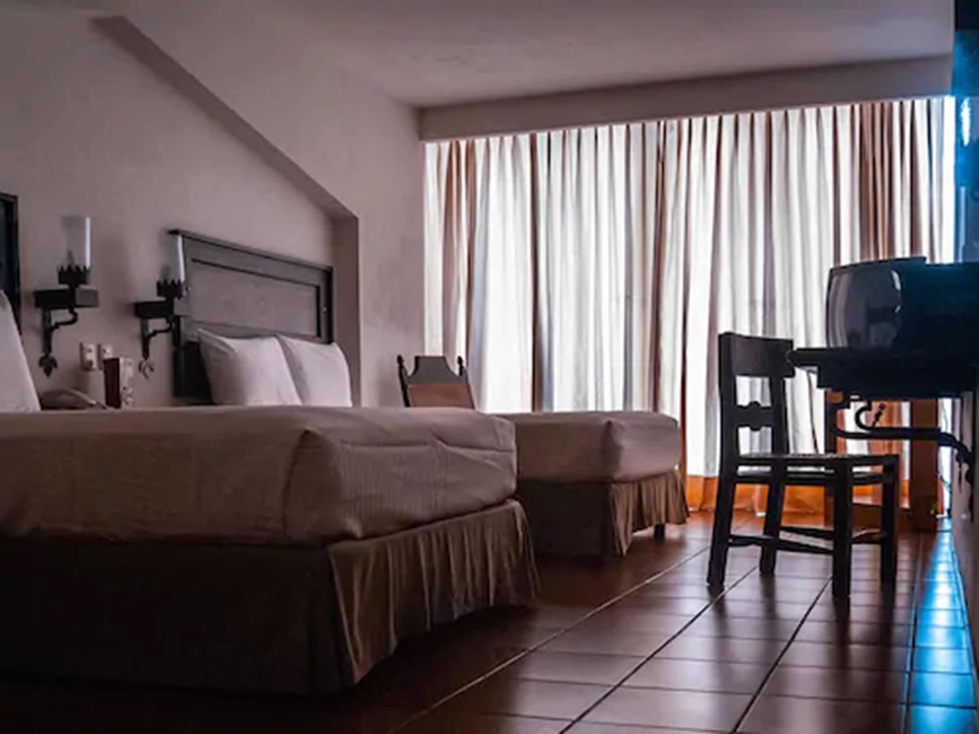Premium bedding, down comforters, blackout drapes, free WiFi