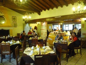 Breakfast, lunch, dinner served; international cuisine, garden views