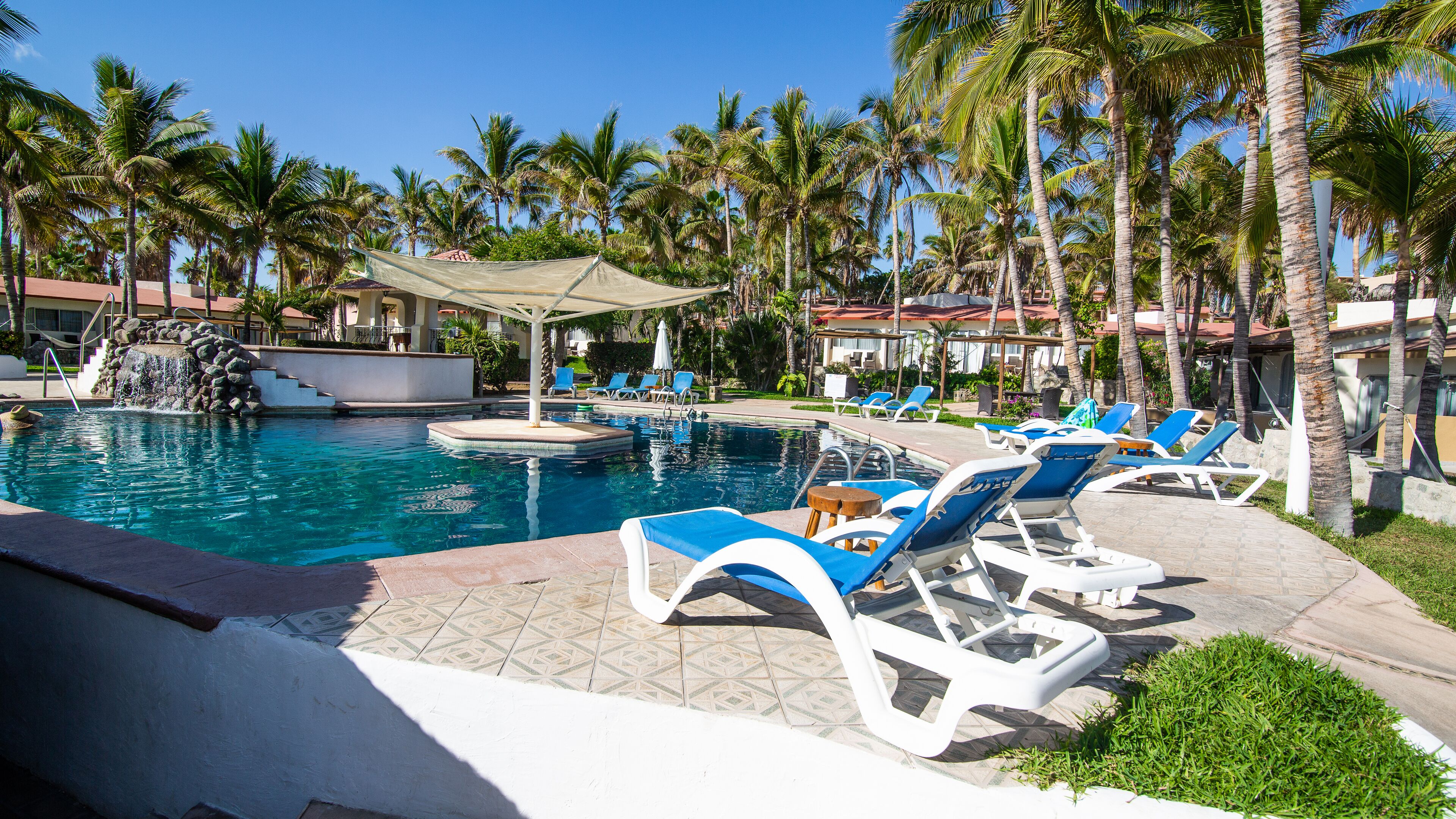 Outdoor pool, pool umbrellas, pool loungers