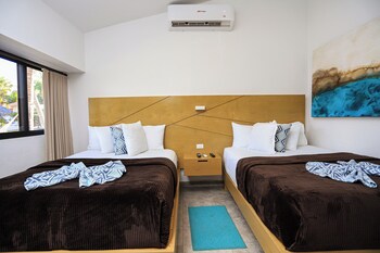 Supreme Room Double | Desk, iron/ironing board, WiFi at Buena Vista Oceanfront & Hot Springs Resort