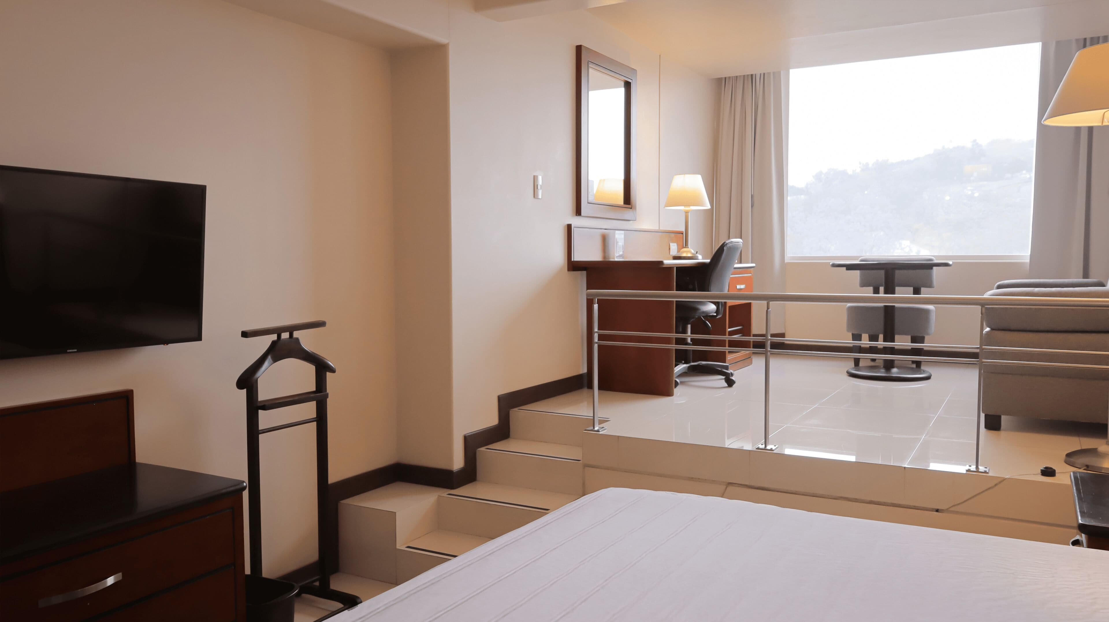 Junior Suite, 1 King Bed with Sofa bed | Premium bedding, in-room safe, desk, iron/ironing board