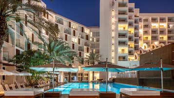 Outdoor pool, open 8 AM to 6 PM, pool umbrellas, pool loungers