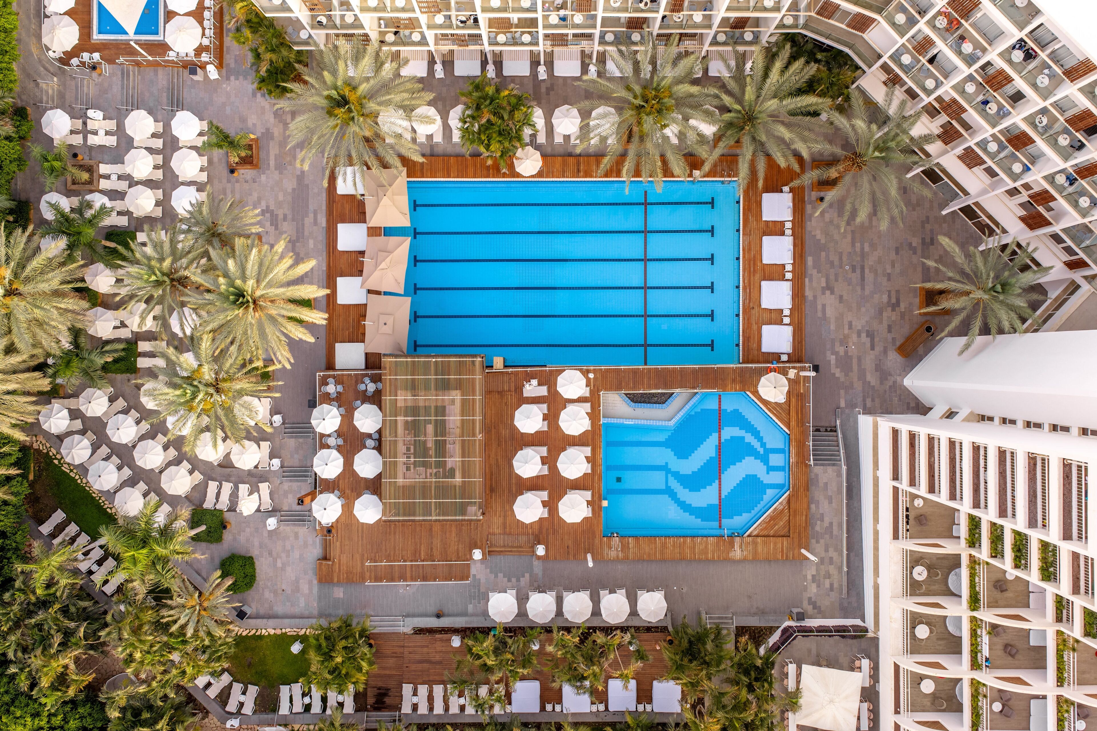 Outdoor pool, open 8 AM to 6 PM, pool umbrellas, pool loungers