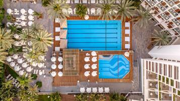 Outdoor pool, open 8 AM to 6 PM, pool umbrellas, pool loungers