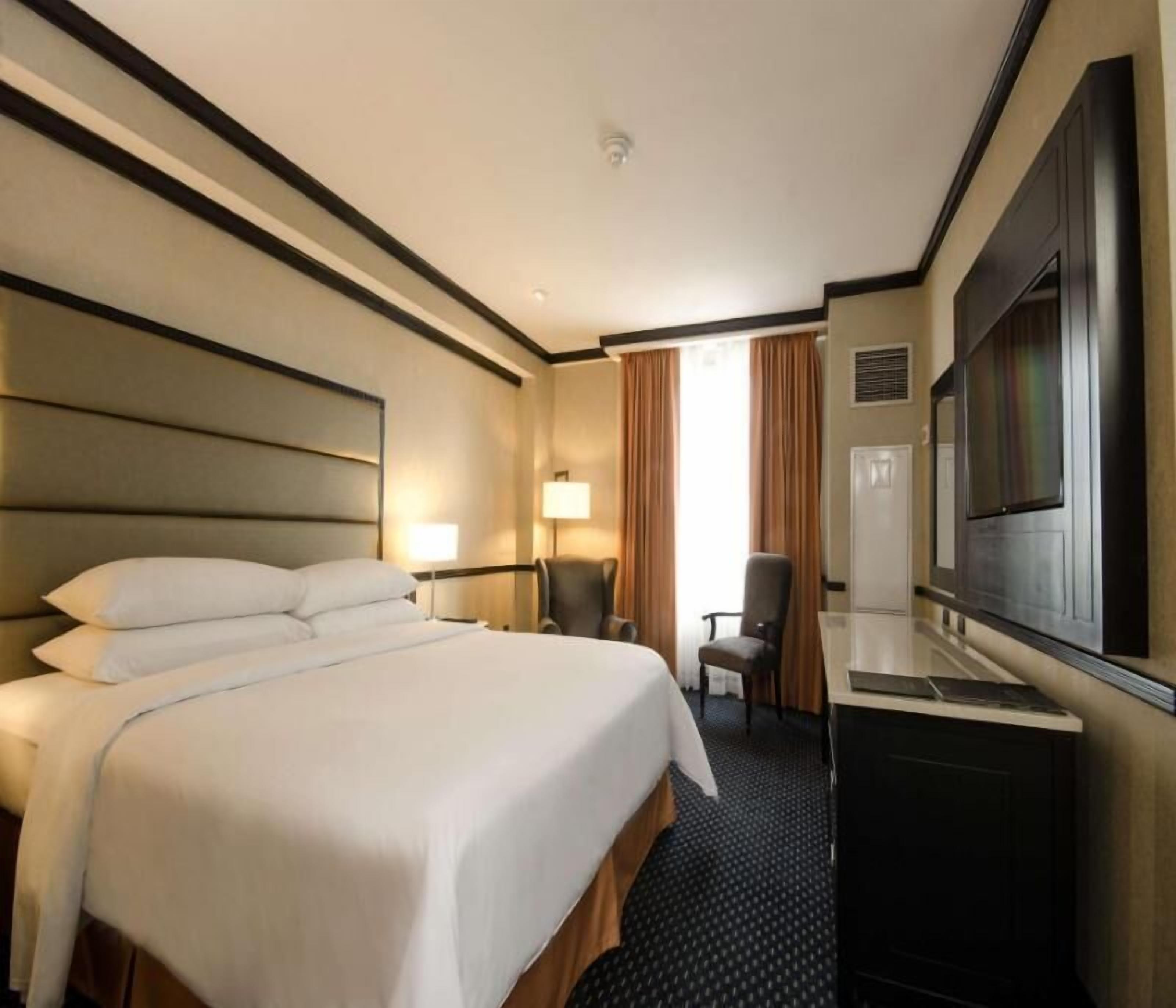 Premium bedding, down duvets, pillow-top beds, in-room safe