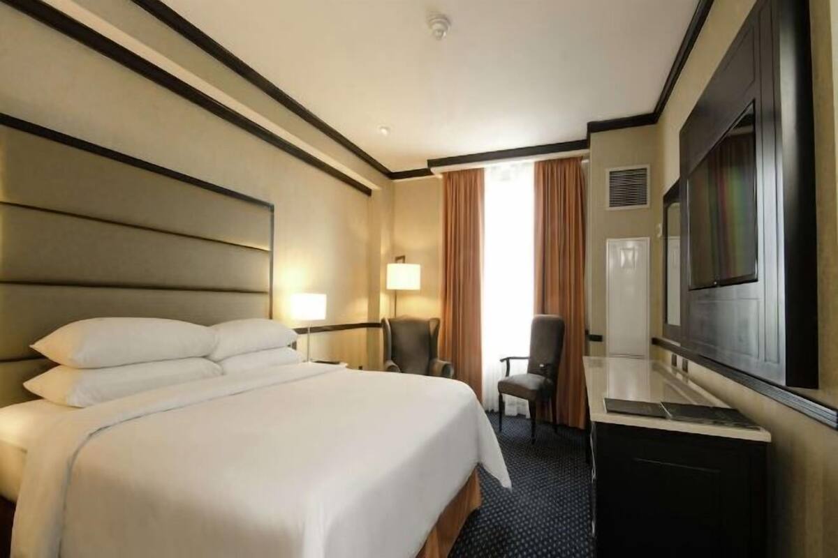 Premium bedding, down duvets, pillow-top beds, in-room safe