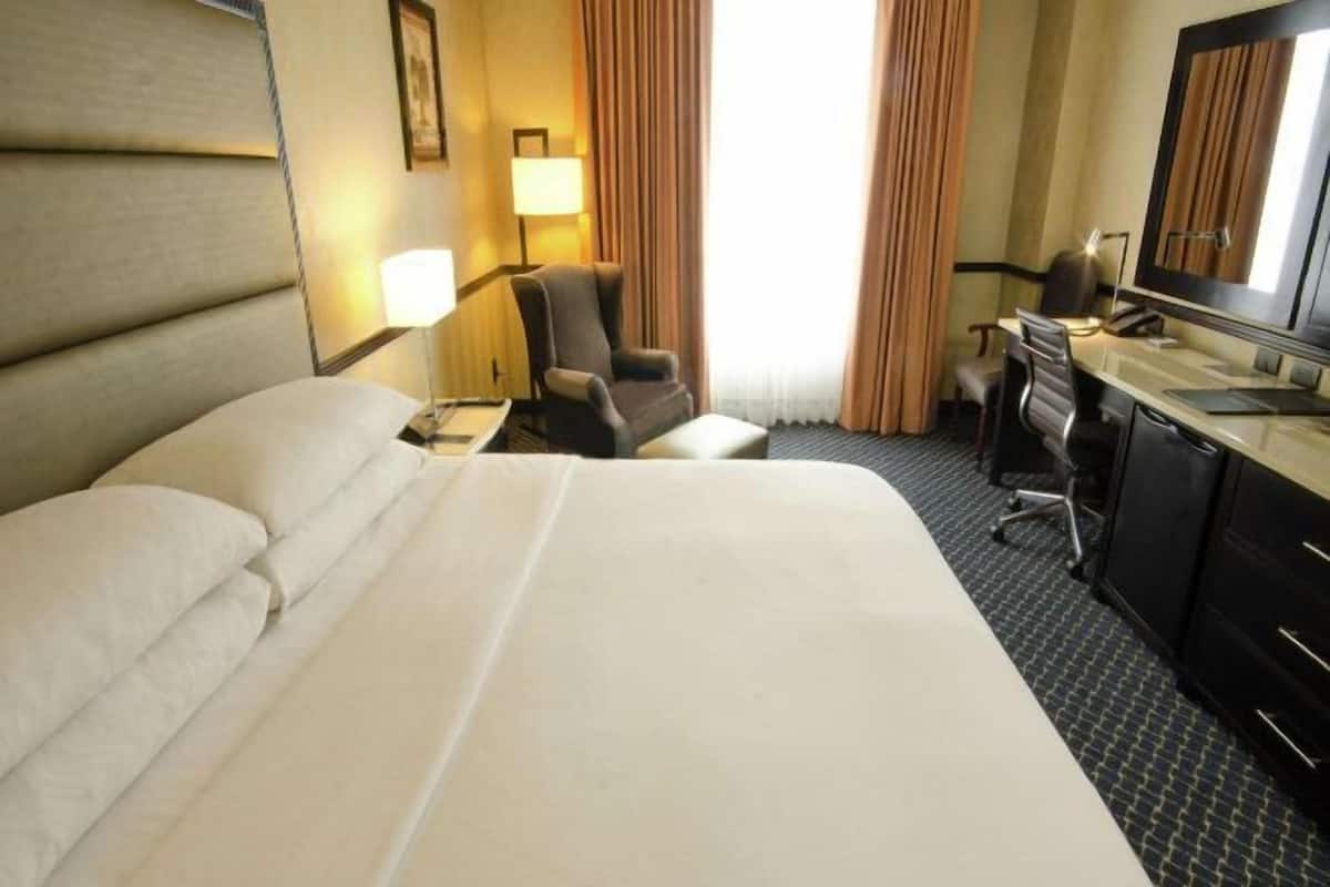 Premium bedding, down duvets, pillow-top beds, in-room safe