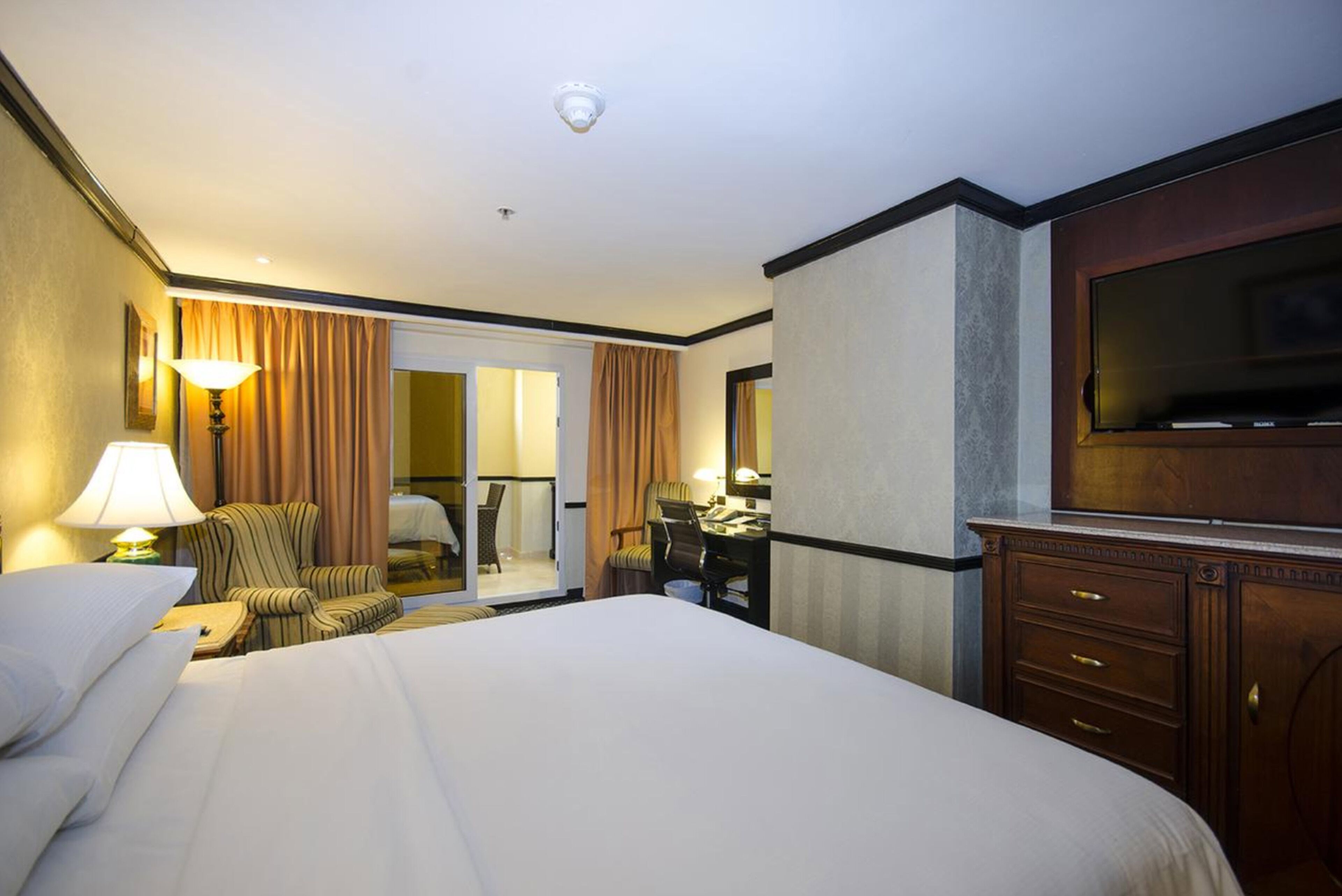 premium bedding, down duvets, pillow-top beds, in-room safe