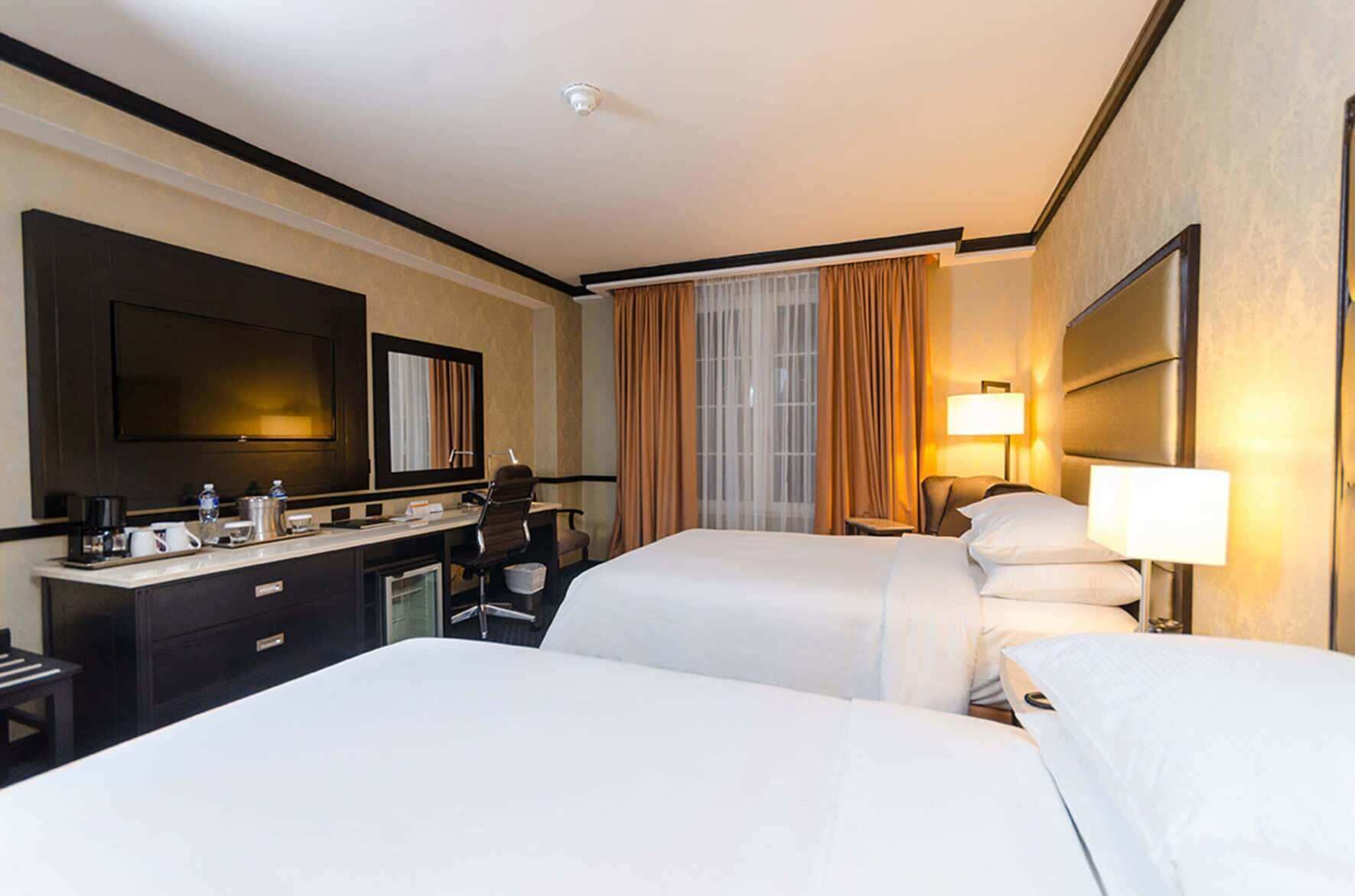 Premium bedding, down duvets, pillow-top beds, in-room safe