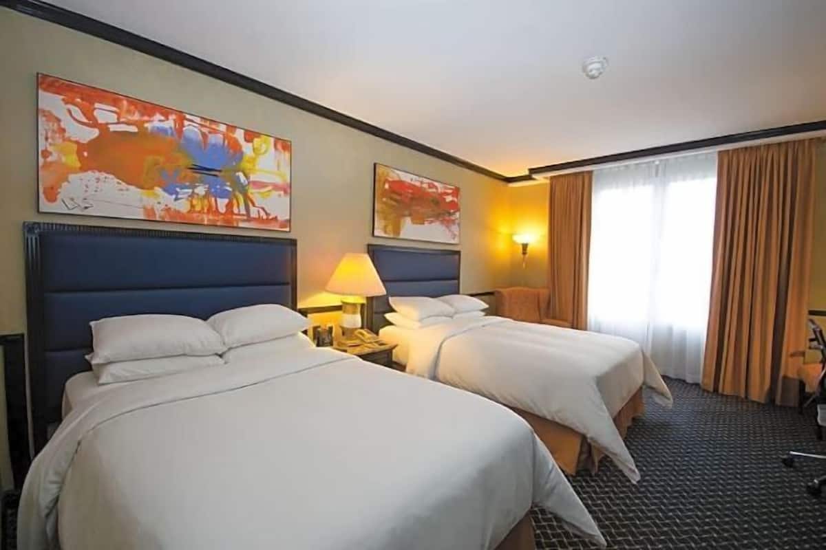 Premium bedding, down duvets, pillow-top beds, in-room safe