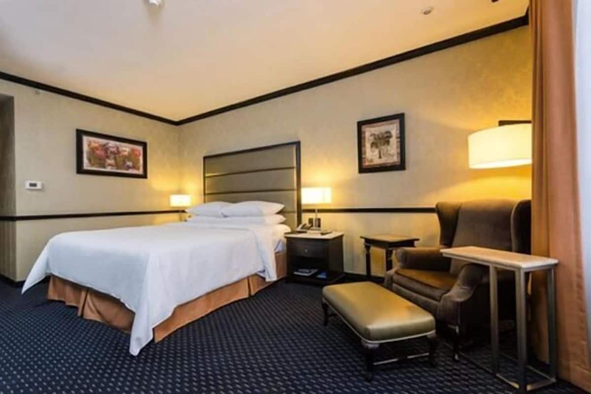 Premium bedding, down duvets, pillow-top beds, in-room safe