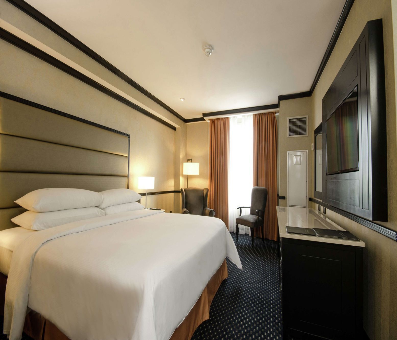 Premium bedding, down duvets, pillow-top beds, in-room safe