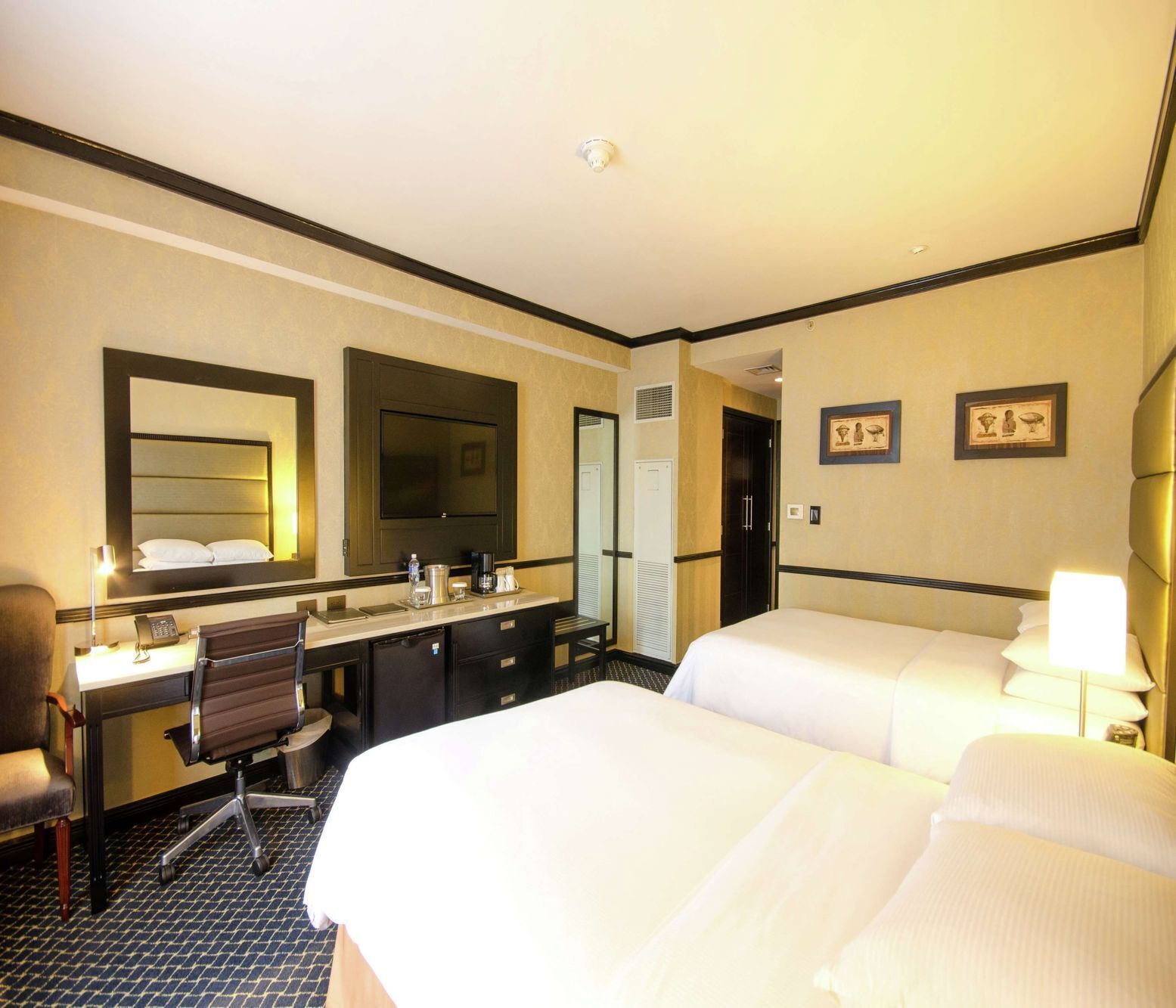 Premium bedding, down duvets, pillow-top beds, in-room safe
