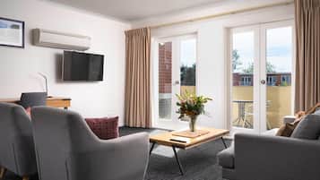 Suite, Multiple Beds, Non Smoking (Efficiency) | Desk, laptop workspace, blackout drapes, iron/ironing board