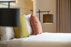 Desk, laptop workspace, blackout drapes, iron/ironing board