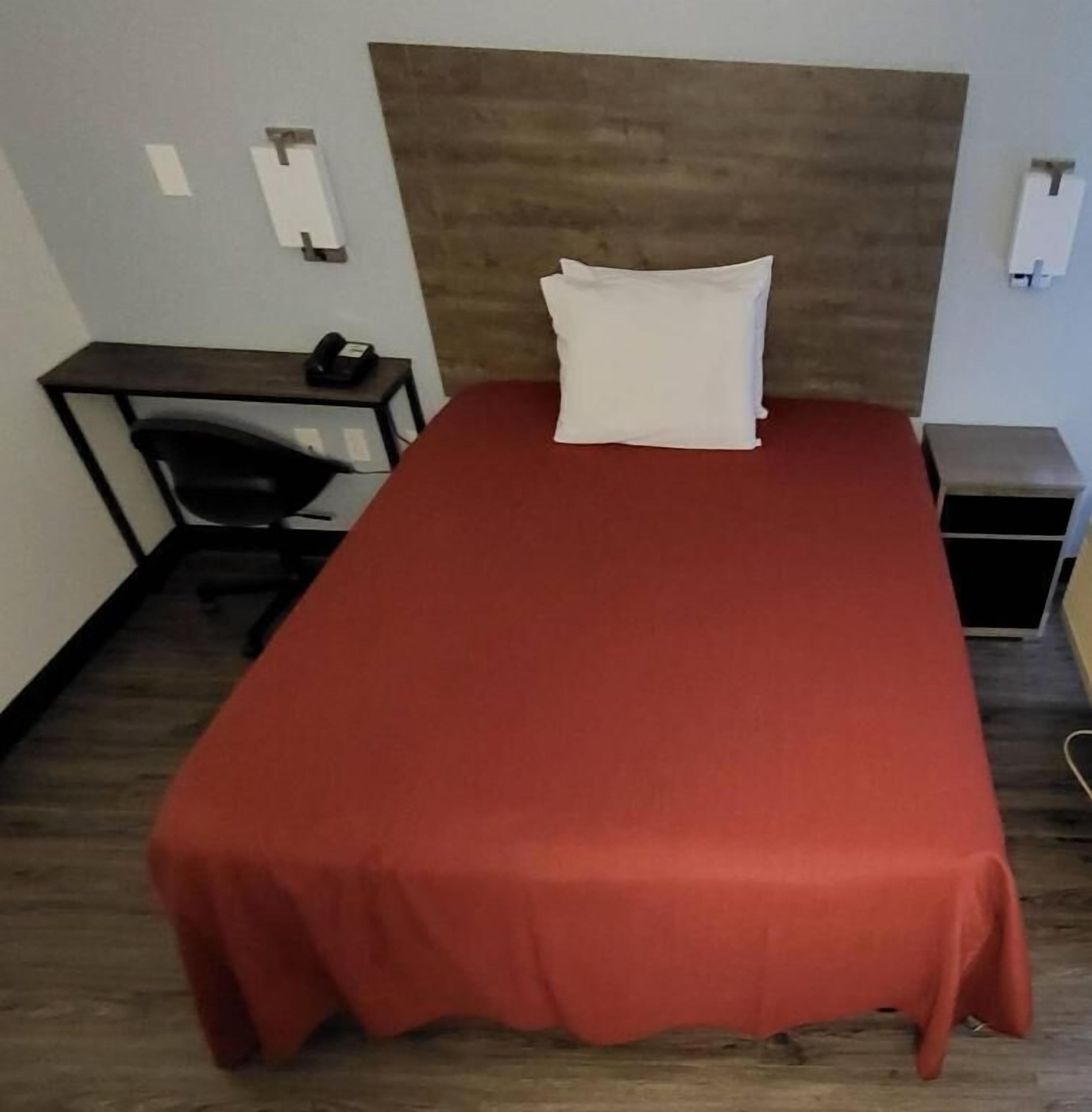 Desk, blackout drapes, free WiFi, bed sheets