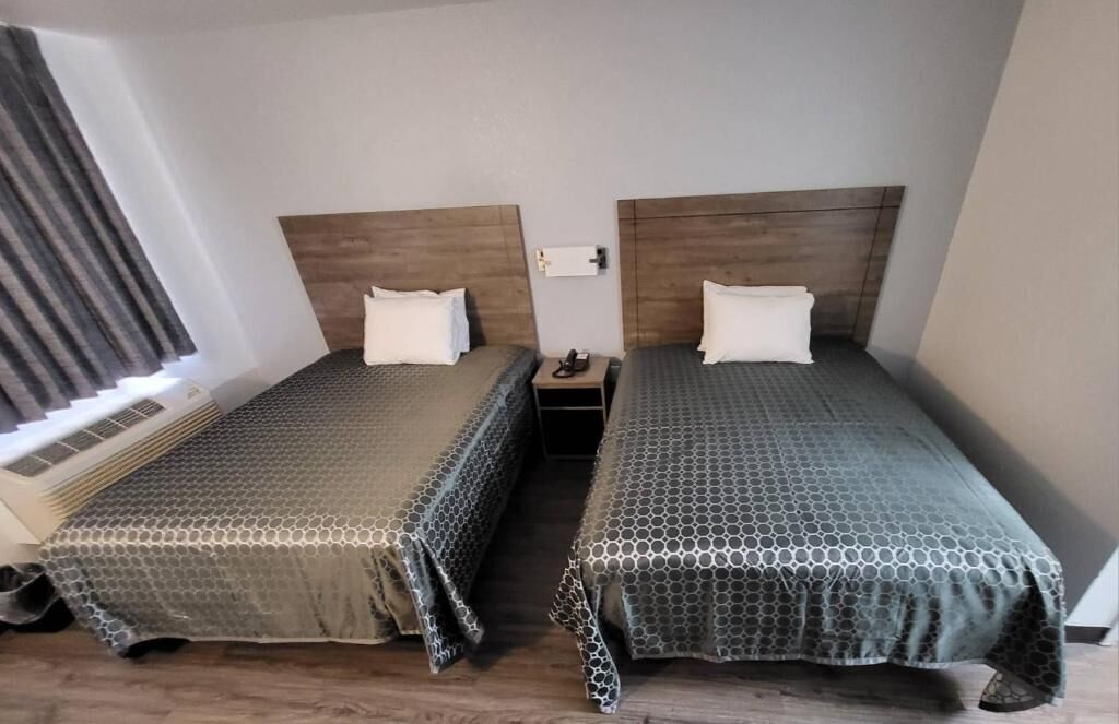 Desk, blackout drapes, free WiFi, bed sheets