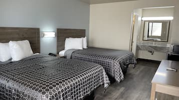 Desk, blackout curtains, free WiFi, bed sheets