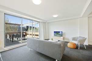 Apartment, 1 Bedroom | Living area | 43-inch flat-screen TV with digital channels, Netflix