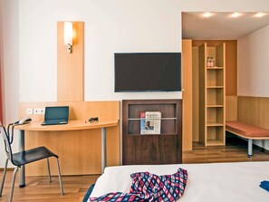 Hypoallergeen beddengoed, een bureau, verduisterende gordijnen