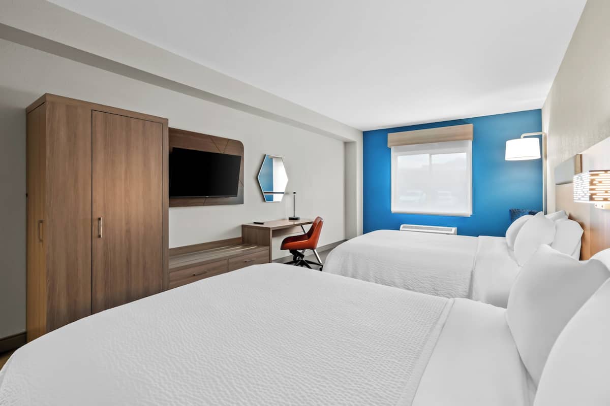 In-room safe, blackout drapes, iron/ironing board, cribs (free)