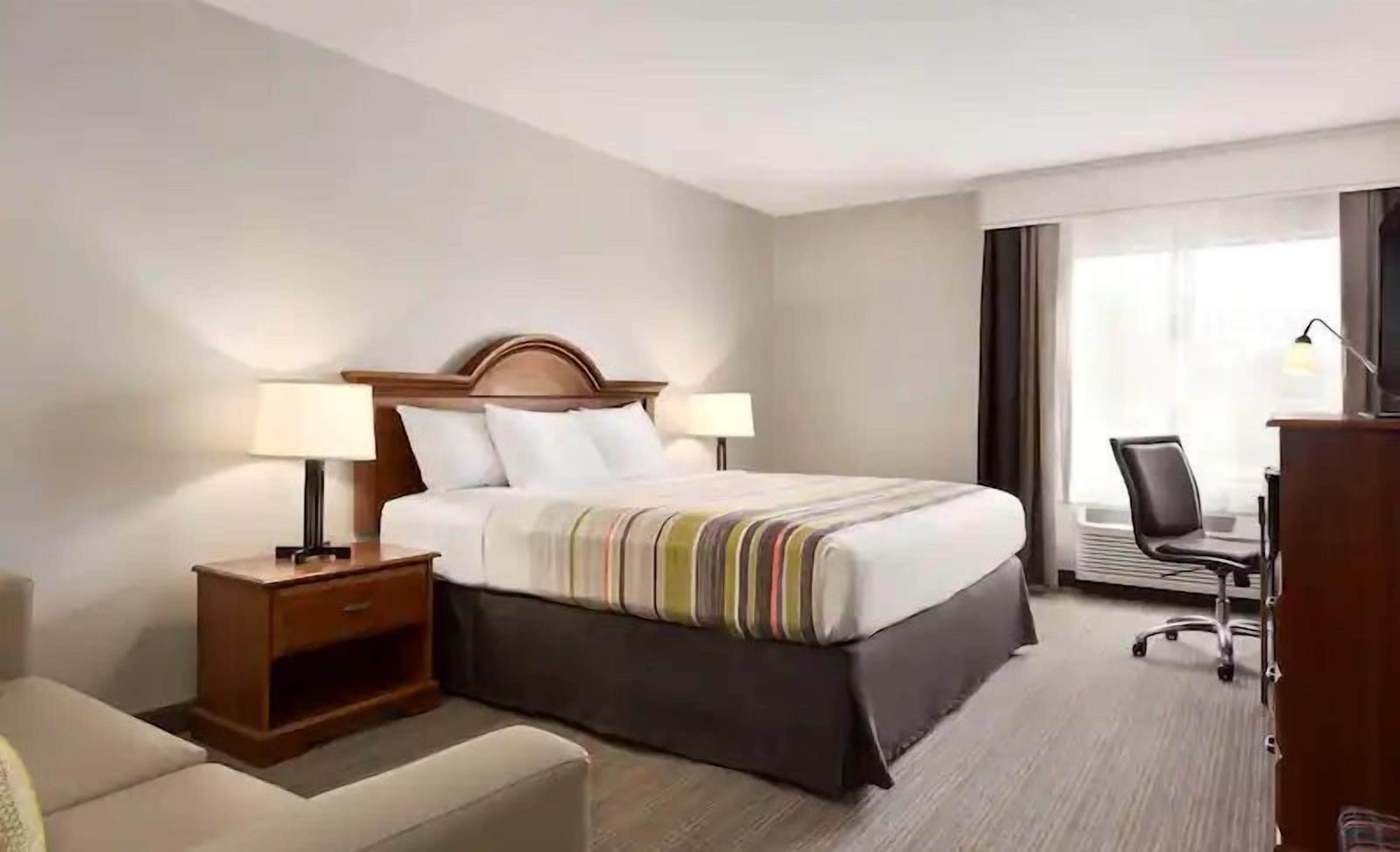 Premium bedding, pillowtop beds, desk, blackout drapes