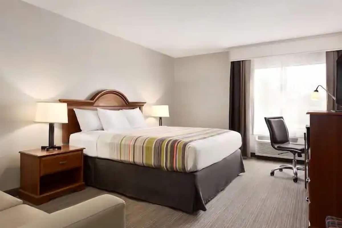 Premium bedding, pillow-top beds, desk, blackout curtains