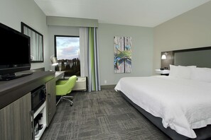 Premium bedding, desk, laptop workspace, blackout curtains