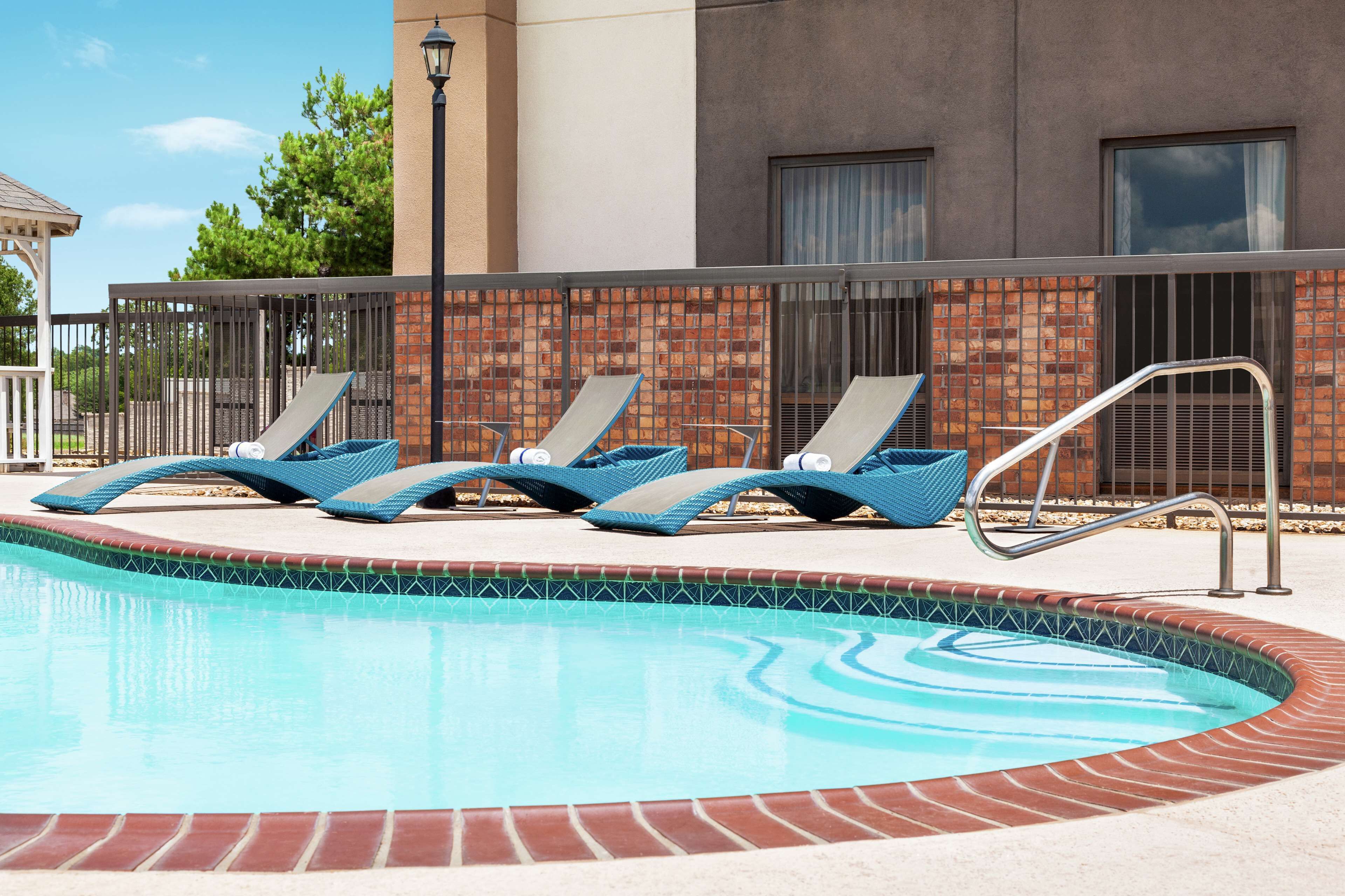 outdoor pool, pool loungers