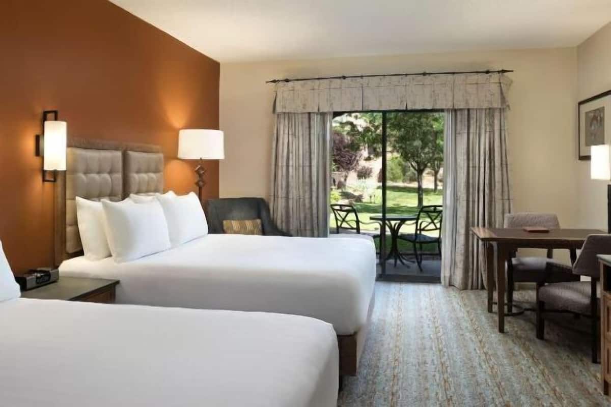 Premium bedding, down duvets, pillow-top beds, in-room safe